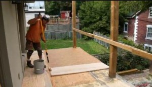Builder Boss Porch and Garden Episode - laying Duradek vinyl membrane