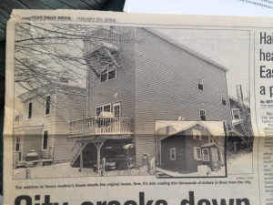 A newspaper clipping from 2002 shows the deck of the house was part of a controversial addition to the original home. (Daily News clipping)