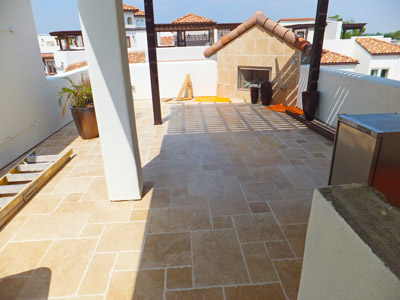 The new tiles are beautiful, but more importantly, underneath them is a reliable, roof-grade waterproofing membrane.