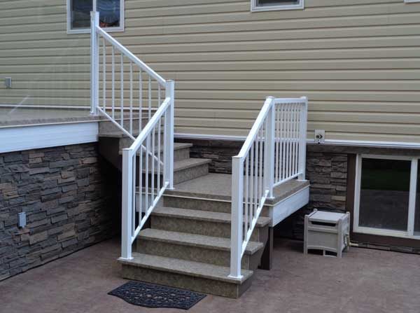 A staircase covered in slip resistant Duradek keeps the wood protected from the elements so the stairs stay safe and secure. 