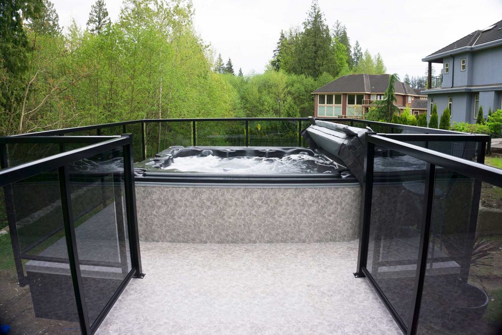 Duradek Forest Floor Alder Vinyl Decking Hot Tub Area with Glass Railing