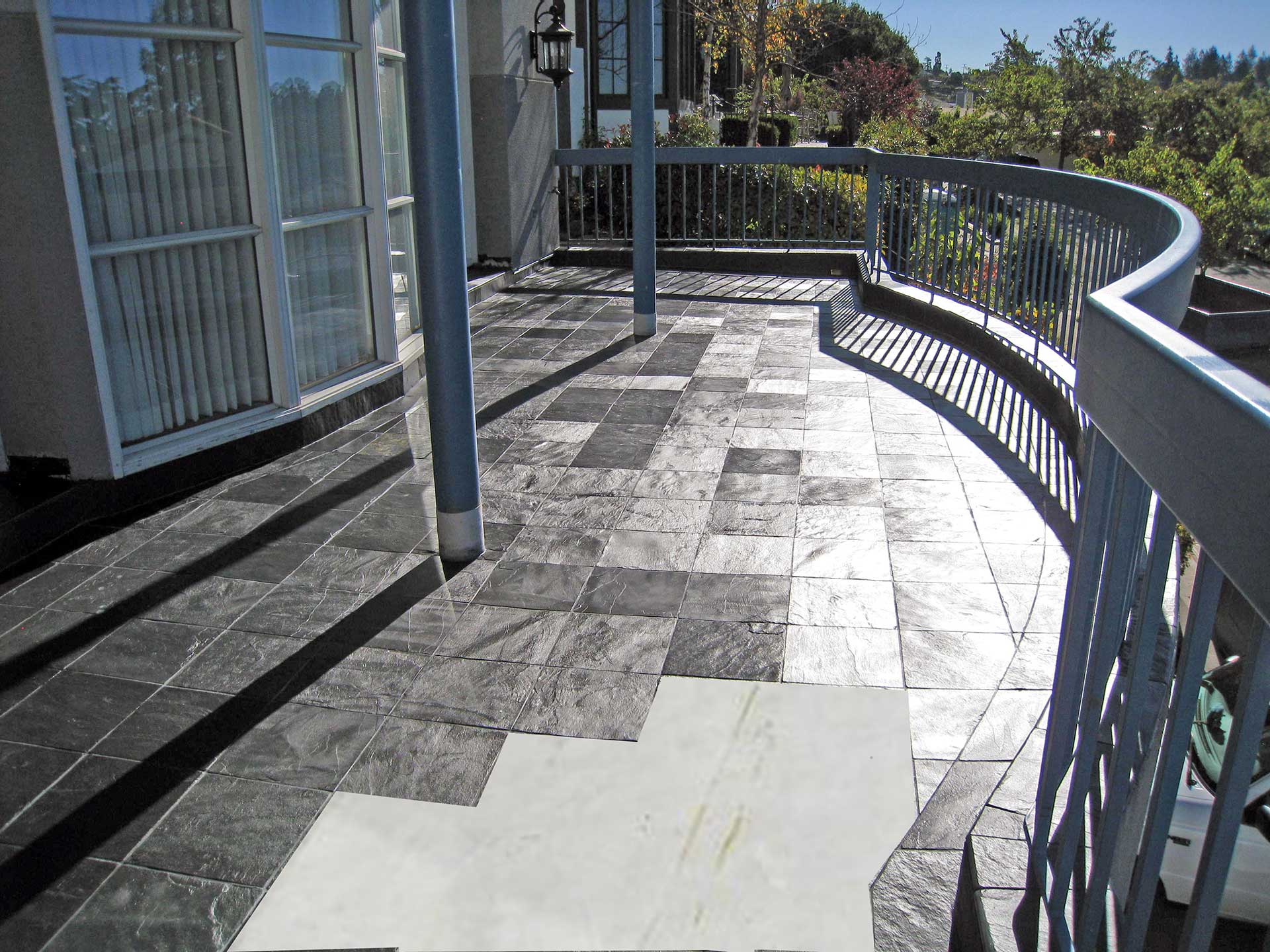 Elevated Tile Deck with Cut-out Showing Tiledek Membrane
