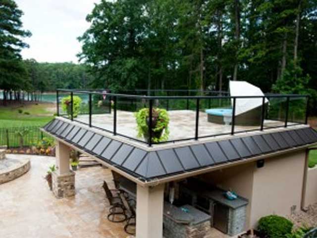 Exterior tile roof deck over pool house waterproofed with Tiledek