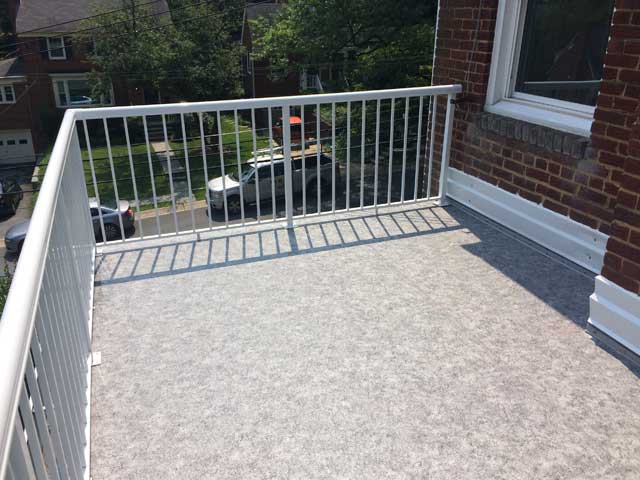 Flat roof transformation from Duradek and Durarail created a new leisure deck for the homeowners