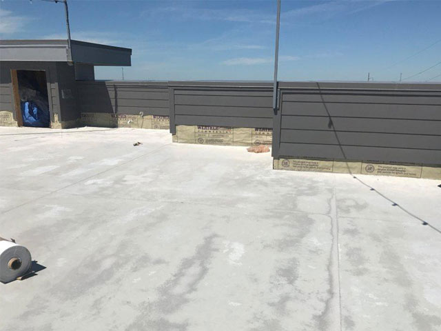 Leaky roof deck prepared for the Duradek waterproof vinyl membrane installation.