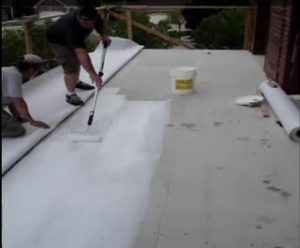 adhering Tiledek membrane for waterproofing under exterior tile
